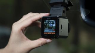 Vantrue E1 Pro dash cam mounted to a car windscreen