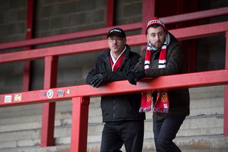 United of Manchester Fans look on during the National League North match between FC United of Manchester v Salford City at the Broadhurst Park on January 28, 2017 in Manchester, England.