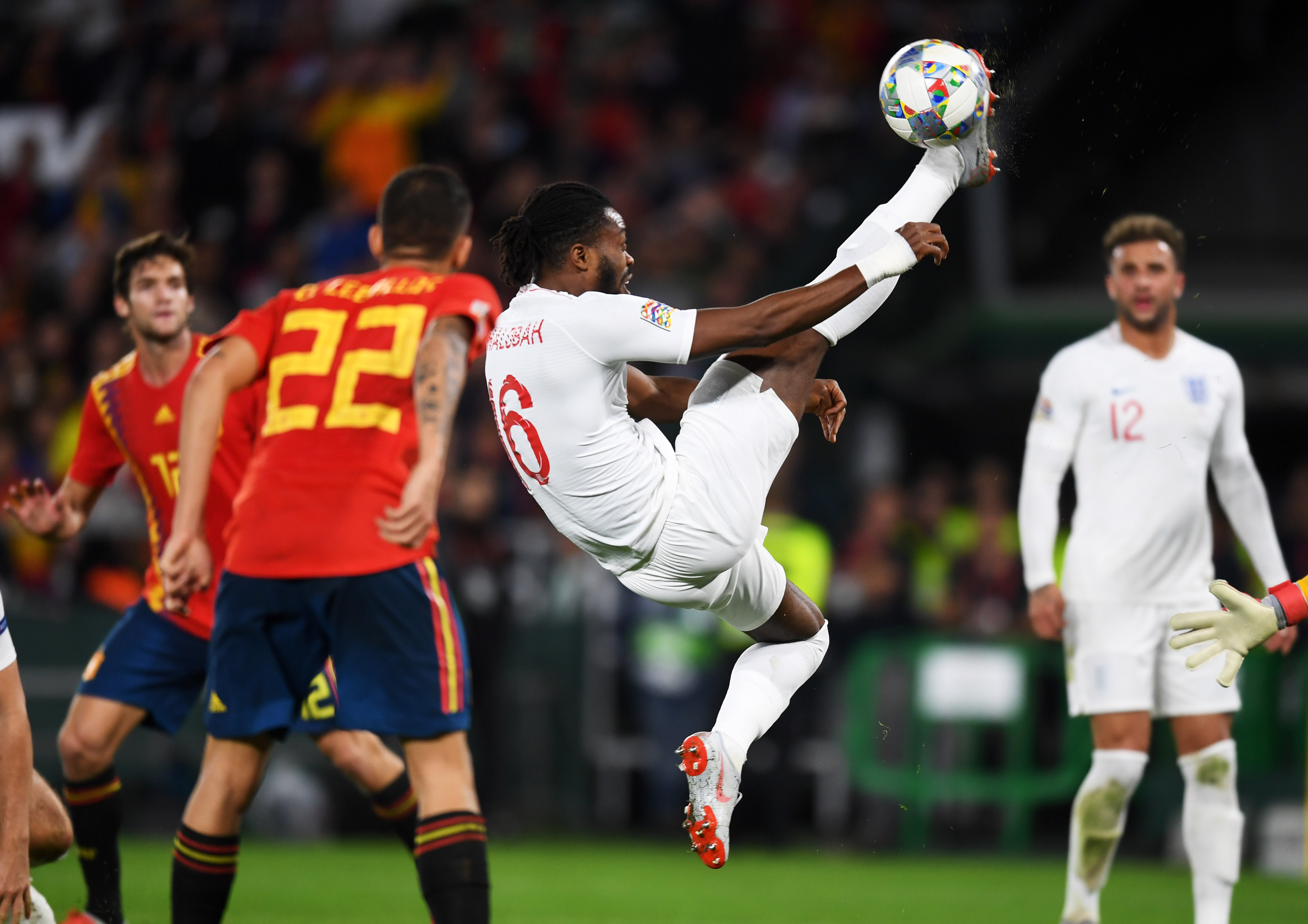 Nathaniel Chalobah clears the ball in a game for England against Spain in October 2018.