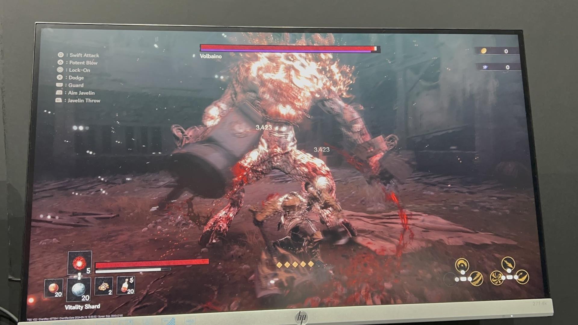 The image shows the player fighting a boss named Volbaino.