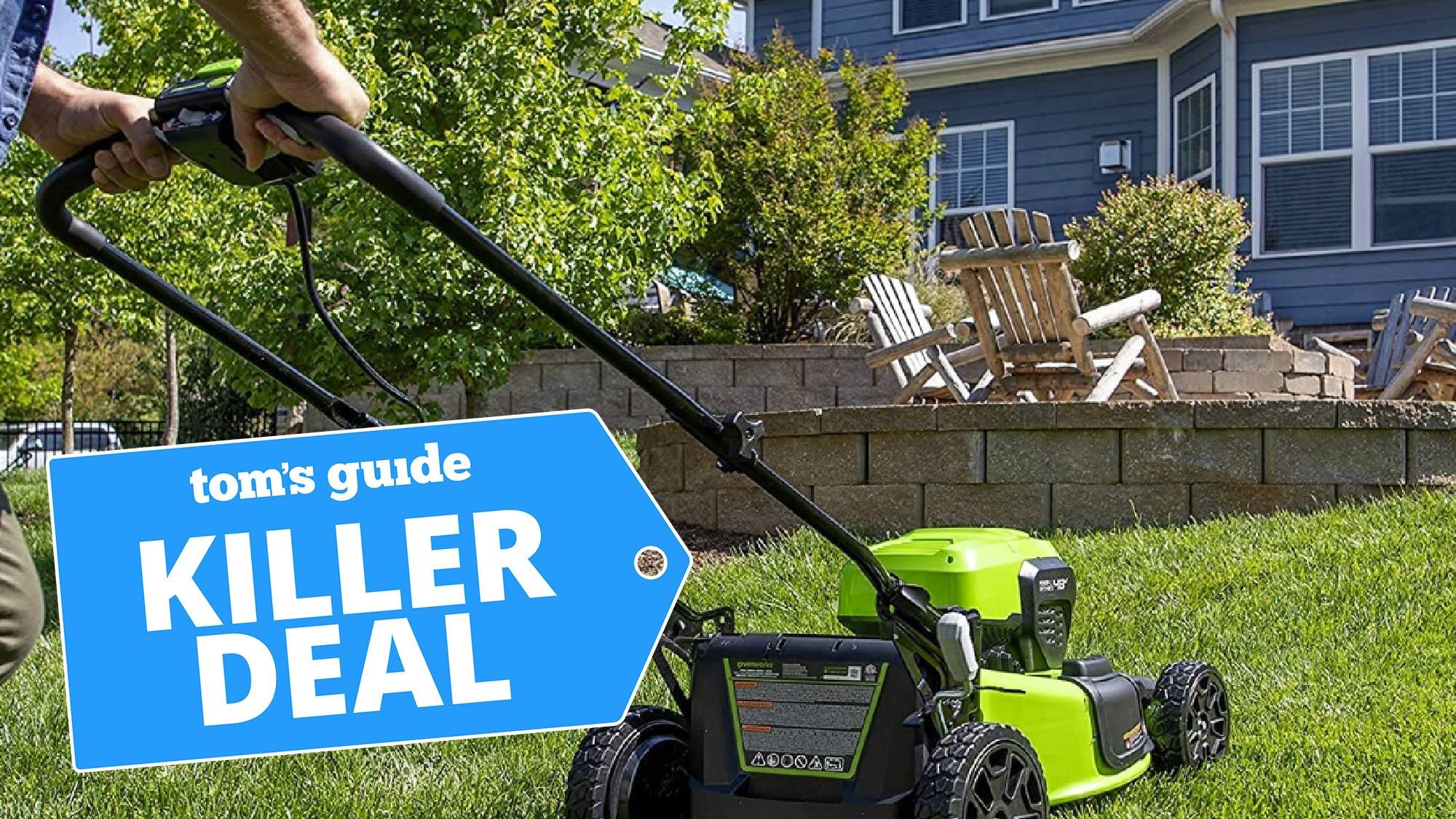 A Greenworks lawnmower being use to cut grass