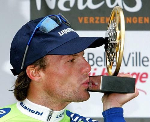 Danilo Di Luca (Liquigas) kisses the winner's trophy