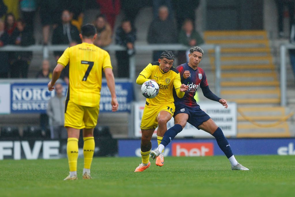 Burton Albion season preview 2023/24 Ethan Ingram of West Bromwich Albion competes with Josh Gordon of Burton Albion during the Pre-Season friendly game between Burton Albion and West Bromwich Albion at Pirelli Stadium on July 22, 2023 in Burton-upon-Trent, England. (Photo by Malcolm Couzens - WBA/West Bromwich Albion FC via Getty Images)