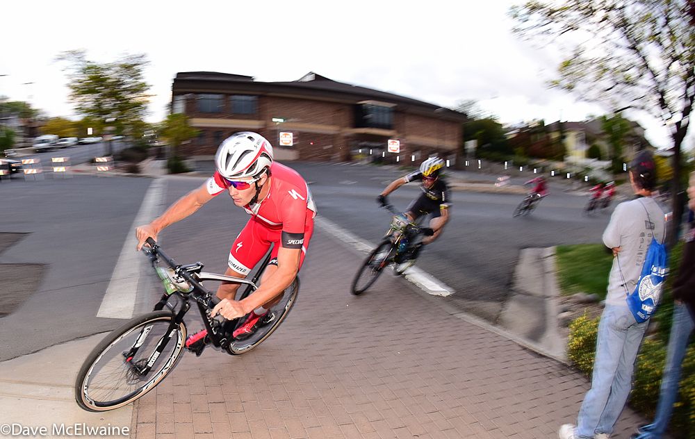 Sam Gaze (Specialized) rounds a tight corner ahead of Zandstra with one lap to go
