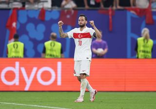 Turkey Euro 2024 squad Hakan Calhanoglu of Turkiye celebrates scoring his team's first goal during the UEFA EURO 2024 group stage match between Czechia and Turkiye at Volksparkstadion on June 26, 2024 in Hamburg, Germany. (Photo by Joosep Martinson - UEFA/UEFA via Getty Images)