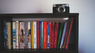 Camera on top of a book shelf