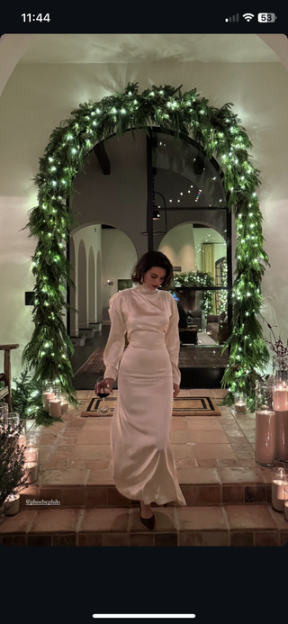 kendall jenner wears a white silk dress and bottega veneta earrings to the 2024 kardashian family christmas party