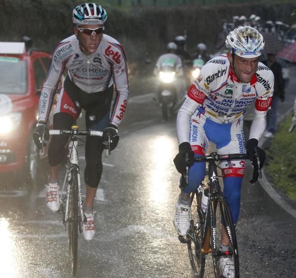 Philippe Gilbert (Omega Pharma-Lotto) eyes his prey, Michele Scarponi (Androni)