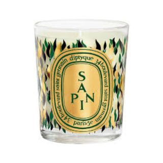 Sapin candle with a gold label