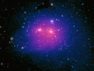 a large purple and blue cloud in space
