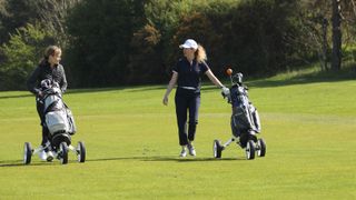 Two female golfers playing at Essendon Golf Club
