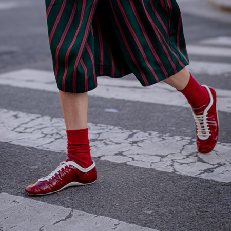 woman wearing a pair of sneakers