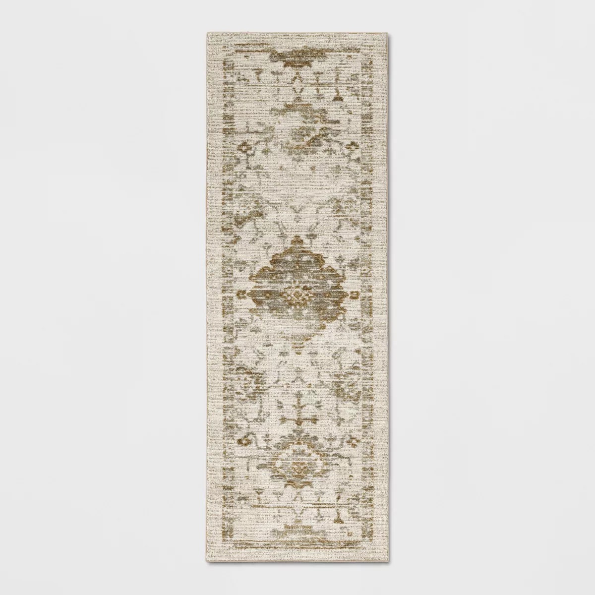 Slim vintage-style runner rug with a muted ivory and olive medallion pattern, designed for narrow hallways or transitional spaces.