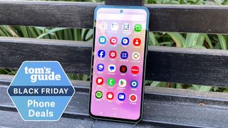 Samsung Galaxy A35 on a bench with a black friday deal badge