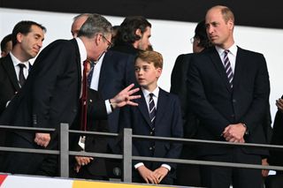 British Prime Minister Keir Starmer (L) speaks with Britain's Prince George of Wales (C) and Britain's Prince William, Prince of Wales ahead of the UEFA Euro 2024 final football match between Spain and England at the Olympiastadion in Berlin on July 14, 2024.