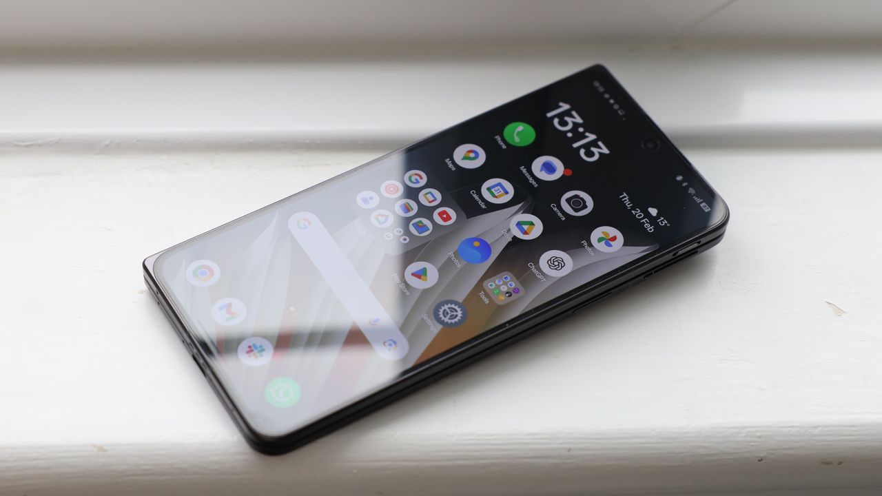 Oppo Find N5 phone on a white painted windowsill