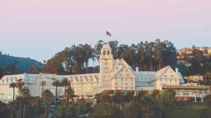 An exterior shot of Claremont Resort and Club at sunset
