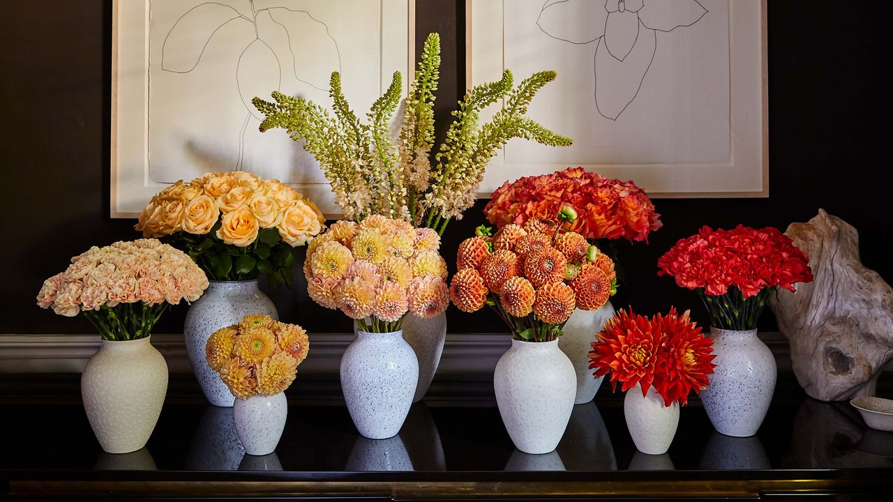 rich hued flowers for fall in white vases