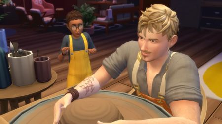 The Sims 4 Businesses & Hobbies - A sim focuses on spinning a pottery wheel while a child watches with excitement