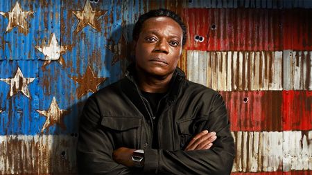 Chukwudi Iwuji as Clemson Murn in promo art for Peacemaker season one