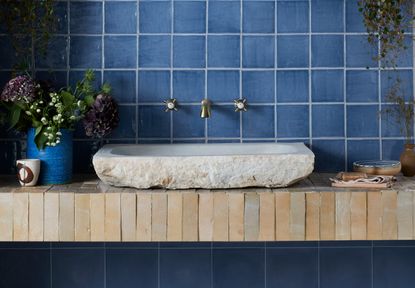 Navy glazed tiles with light blue grout lines