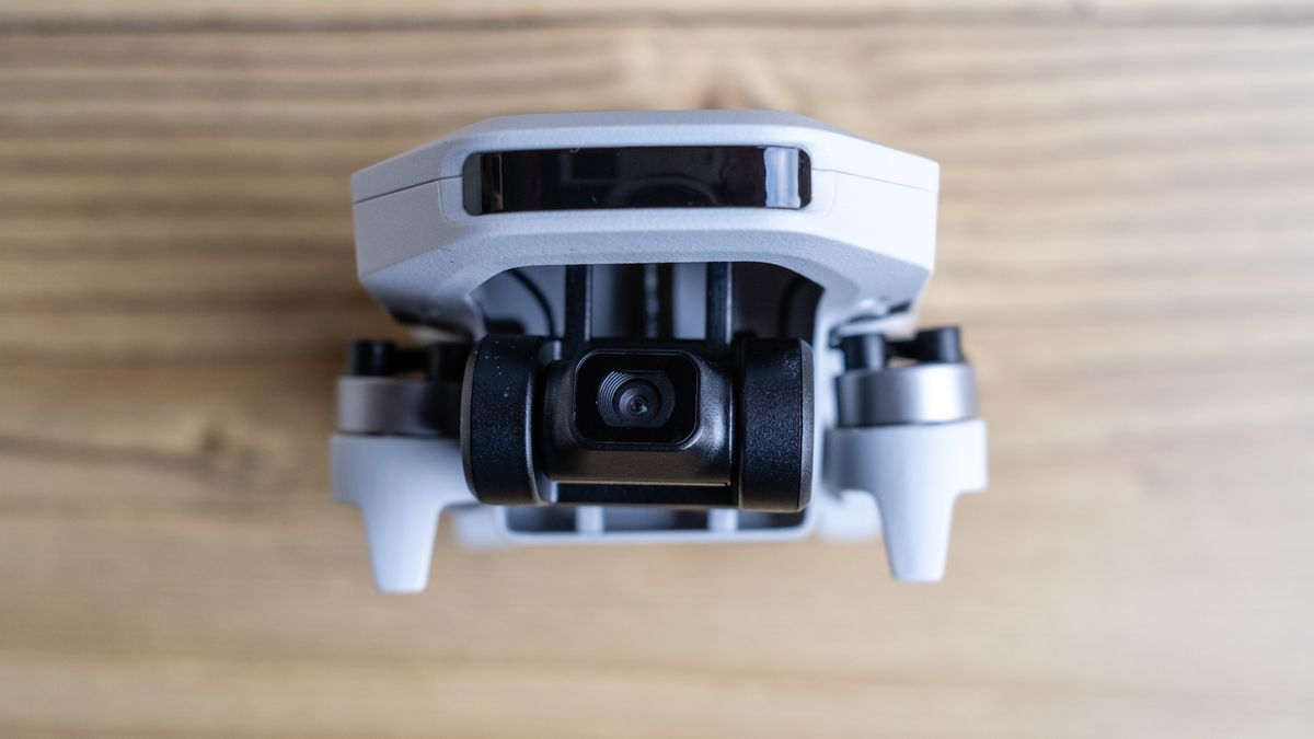 Potensic Atom SE drone on a wooden floor