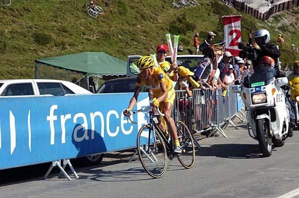 Rasmussen during his late attack taking out more time on Contador.