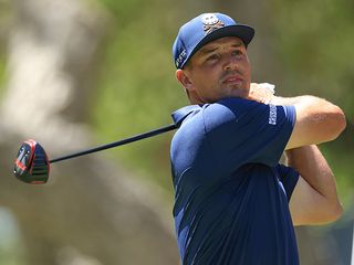 Bryson DeChambeau with a driver in the finish position of the swing