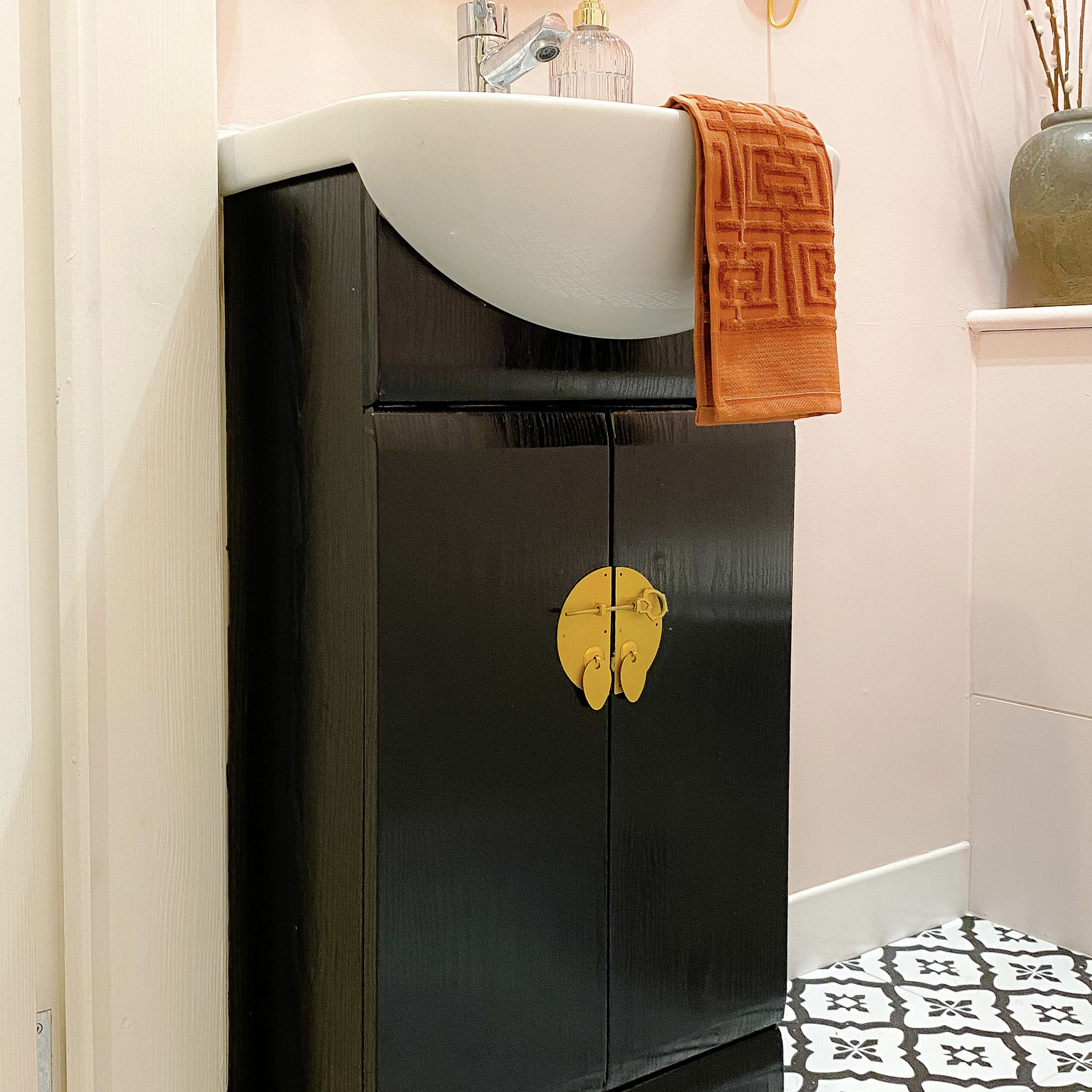 bathroom with black vanity