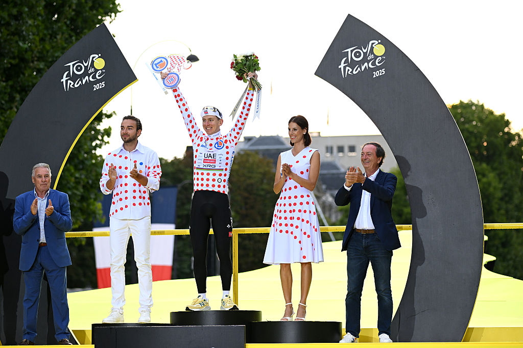 PARIS - CHAMPS-ELYSEES, FRANCE - JULY 27: Tadej Pogacar of Slovenia and UAE Team Emirates - XRG celebrates at podium as Polka dot Mountain Jersey winner during the 112th Tour de France 2025, Stage 21 a 132.3km stage from Mantes-la-Ville to Paris - Champs-Elysees / #UCIWT / on July 27, 2025 in Paris - Champs-Elysees, France.