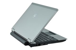 The battery noticeably protrudes from the rear of the HP EliteBook 2540p