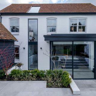 White period home with glass extension idea