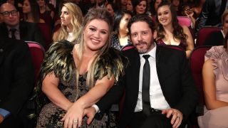 Clarkson and Blackstock smiling at the 2017 AMAs