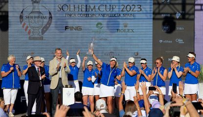 Team Europe stand on the stage after winning the Solheim Cup