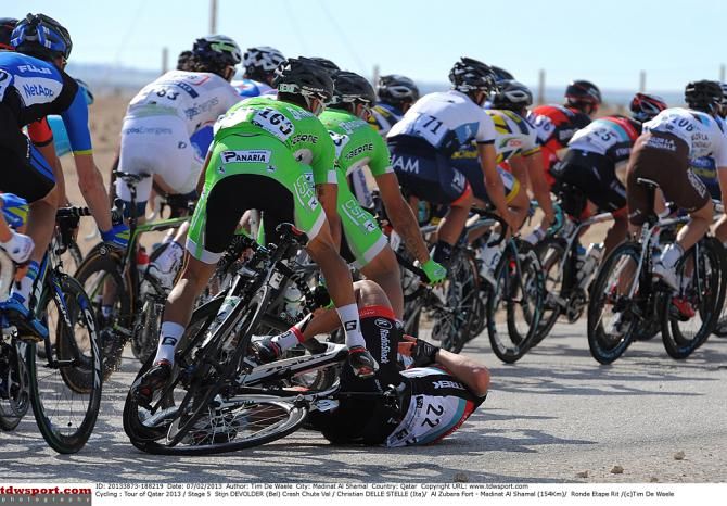 Stijn Devolder about to end up at the bottom of a pile of riders in the 2013 Tour of Qatar