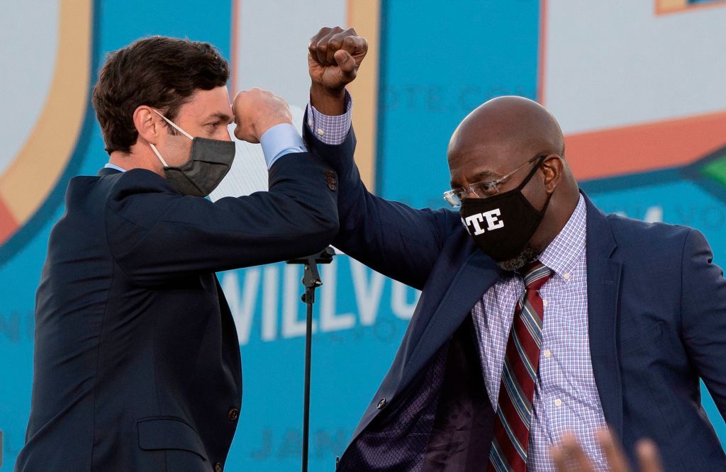 Democrats Jon Ossoff and Raphael Warnock.