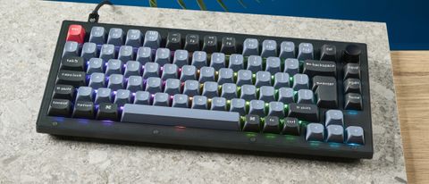 A Keychron V1 wired mechanical keyboard, in the frosted black (translucent) colorway