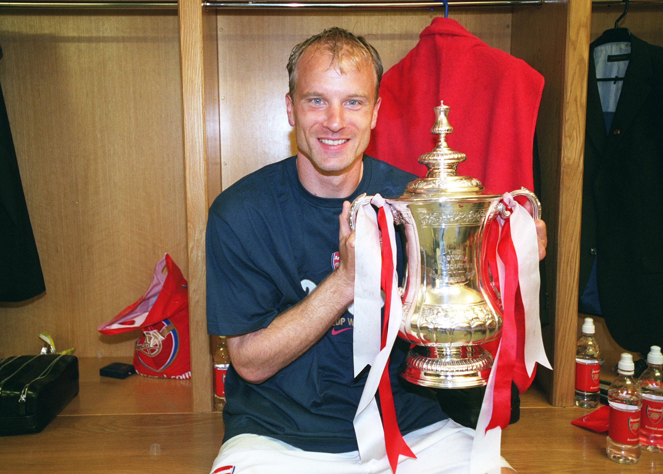 Dennis Bergkamp of Arsenal with the FA Cup Trophy after the FA Cup Final match between Arsenal and Manchester United on May 21, 2005 in Cardiff, Wales.
