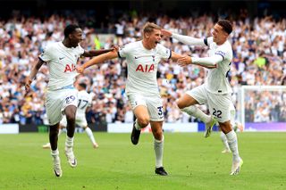 Micky van de Van celebrates with Pape Matar Sarr and Brennan Johnson as Tottenham beat Sheffield United deep into added time in the Premier League in September 2023.