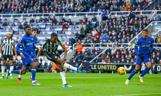 Newcastle United's Alexander Isak scores the opening goal during the Premier League match between Newcastle United and Chelsea FC at St. James Park on November 25, 2023 in Newcastle upon Tyne, United Kingdom