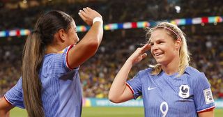 France Women's World Cup 2023 squad: Eugenie Le Sommer of France (R) celebrates with teammate Selma Bacha (L) after scoring a goal during the FIFA Women's World Cup Australia & New Zealand 2023 Group match between France and Brazil at Brisbane Stadium. France won the game 2-1.