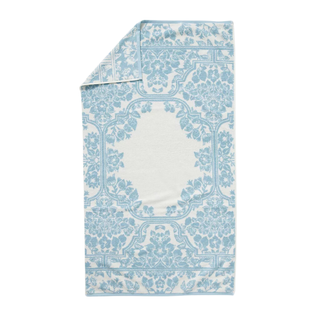 A white and blue patterned towel