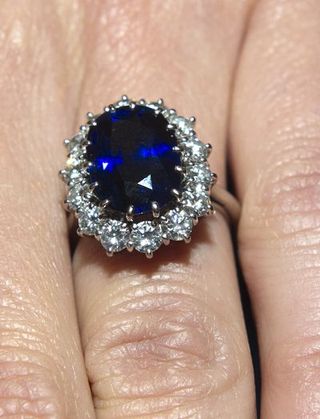 Jewellery, Ring, Engagement ring, Fashion accessory, Blue, Gemstone, Wedding ring, Pre-engagement ring, Finger, Diamond,