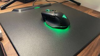 Razer HyperFlux V2 Charging Mouse System mouse pad with Basilisk V3 Pro 35K gaming mouse on top