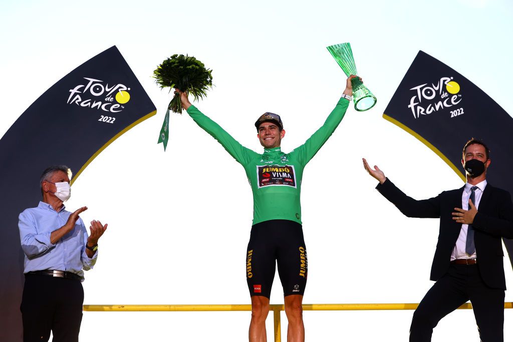 PARIS FRANCE JULY 24 Wout Van Aert of Belgium and Team Jumbo Visma celebrates winning the Green Points Jersey on the podium ceremony after the 109th Tour de France 2022 Stage 21 a 1156km stage from Paris La Dfense to Paris Champslyses TDF2022 WorldTour on July 24 2022 in Paris France Photo by Michael SteeleGetty Images