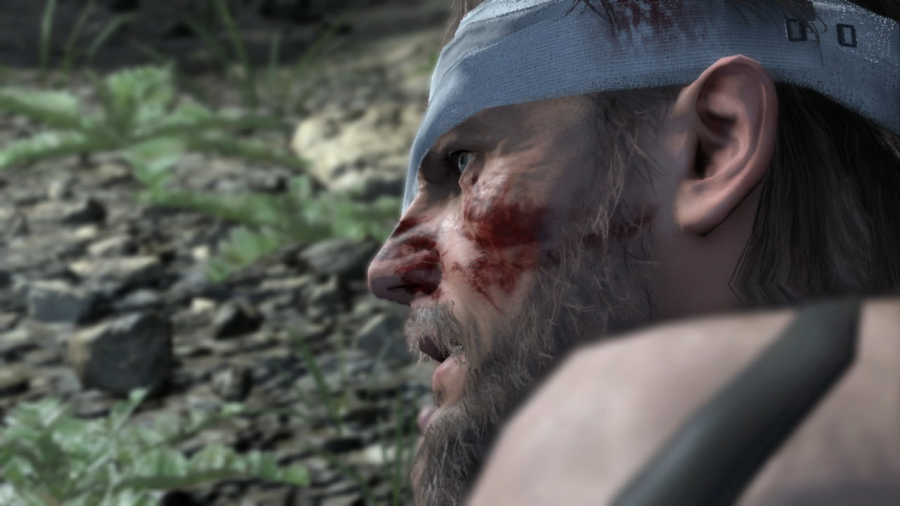 Metal Gear Solid 5's Snake with a bloodied face