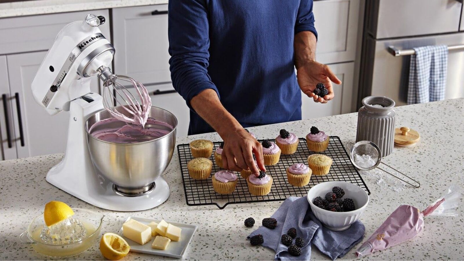KitchenAid stand mixer in white on countertop, cooking cakes