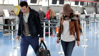 Blake Lively and Ryan Reynolds stroll through the airport