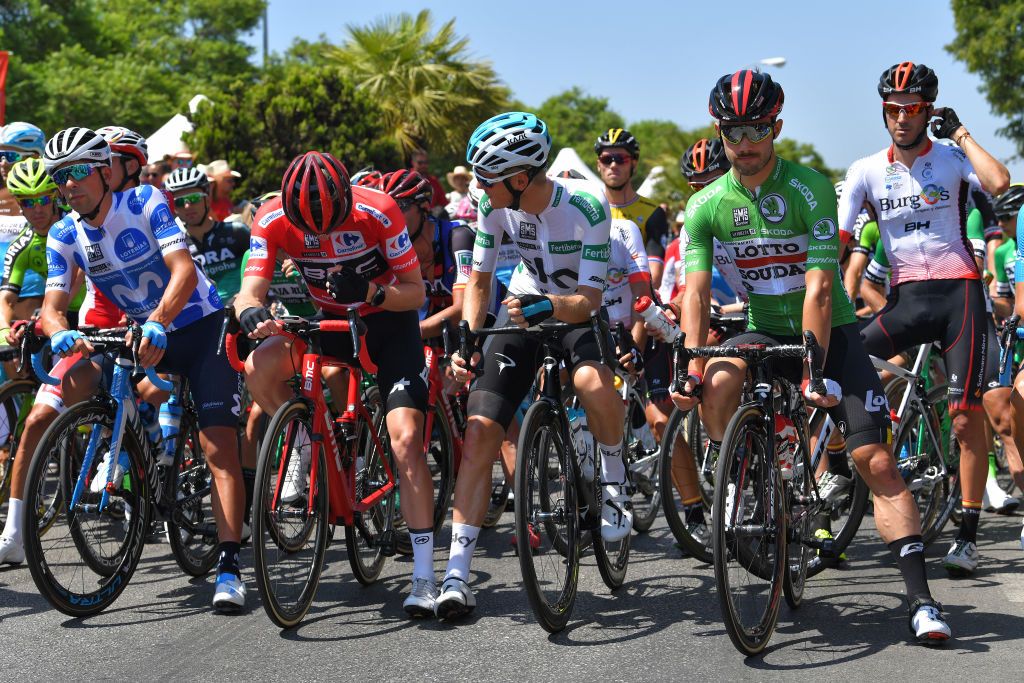 Rohan Dennis (BMC), Dylan van Baarle and Victor Campenaerts in the Vuelta a Espana leader's jersey before stage 2