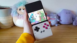 GameSir Pocket Taco attached to Asus ROG Phone 9 Pro with Zelda: Oracle of Ages for Game Boy cut scene on screen.